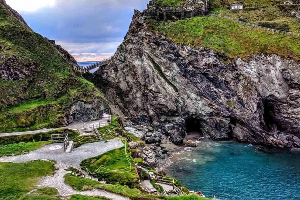 Visit the famous Tintagel Castle- home of King Arthur! We also explored the aswesome Merlin's Cave- definitely a must if you're in Cornwall. #tintagel #castle #uk #cornwall #merlin #cave #camelot #placestovisit #thingstodo #england #visit #traveltips #trave