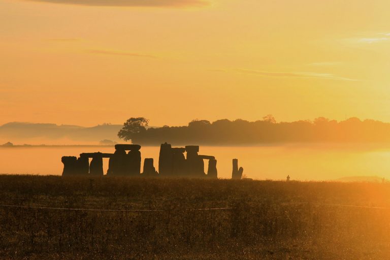 Stonehenge. One of the most iconic landmarks in England, if not the world. If you're lucky, you can watch the most incredible sunrise over these stones- it was one of the most magical mornings in my life. Just watch the video to see for yourself! #stonehenge #england #roadtrip #traveltips #adventure #beautifulplaces #UK #travel