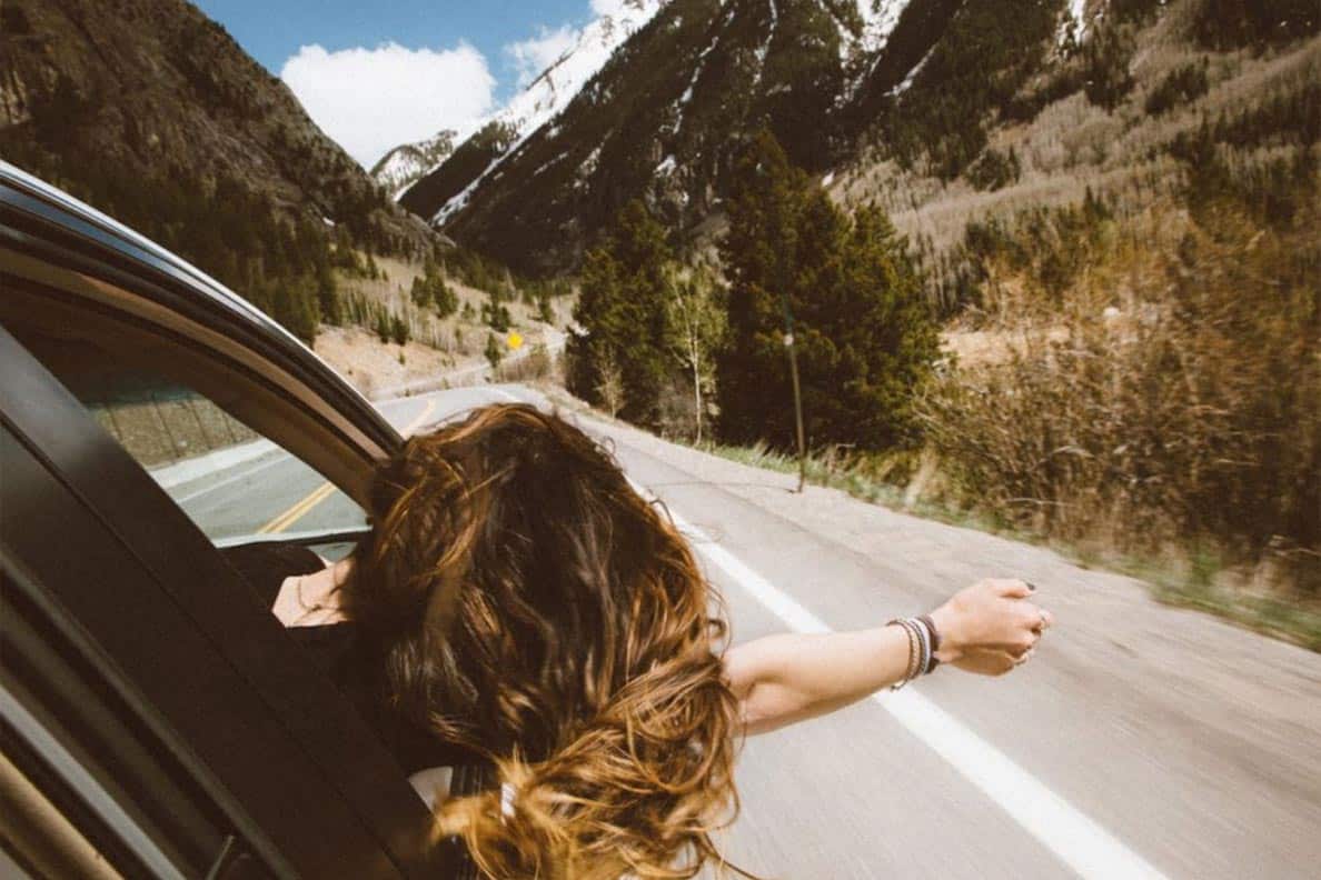 100+ Best Road Trip songs (to sing along with as you drive!)