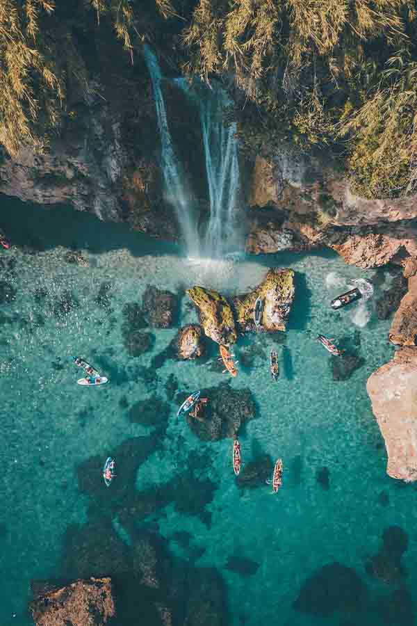 An aerial view of the beautiful waters and waterfalls of Nerja, Spain.