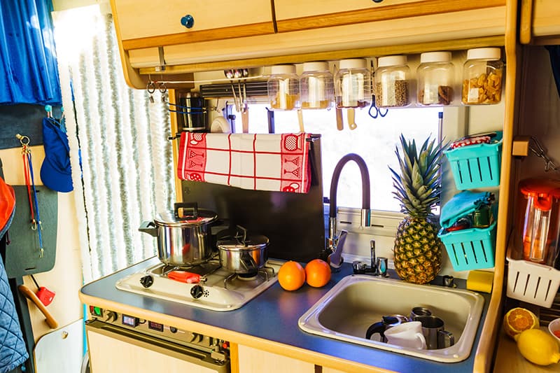 Best camper kitchen accessories and storage solutions for motorhomes